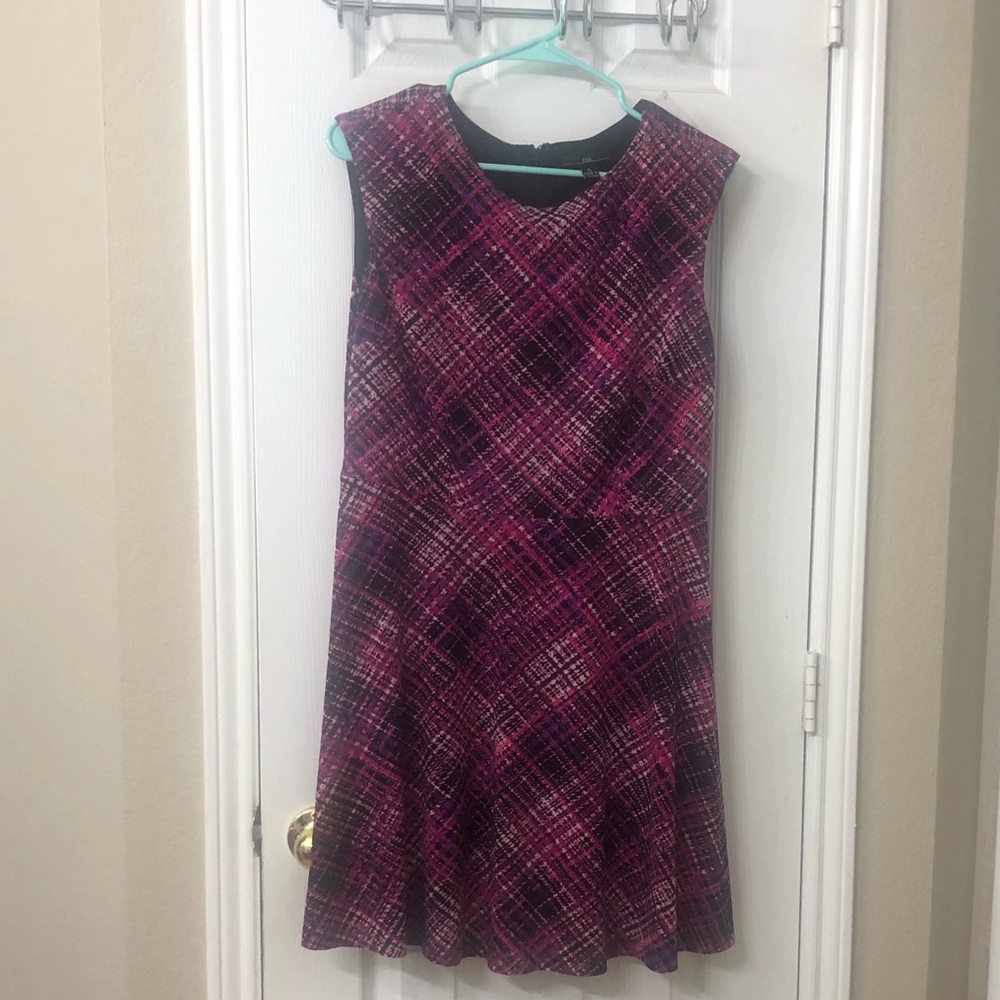 Sleeveless multi colored dress.